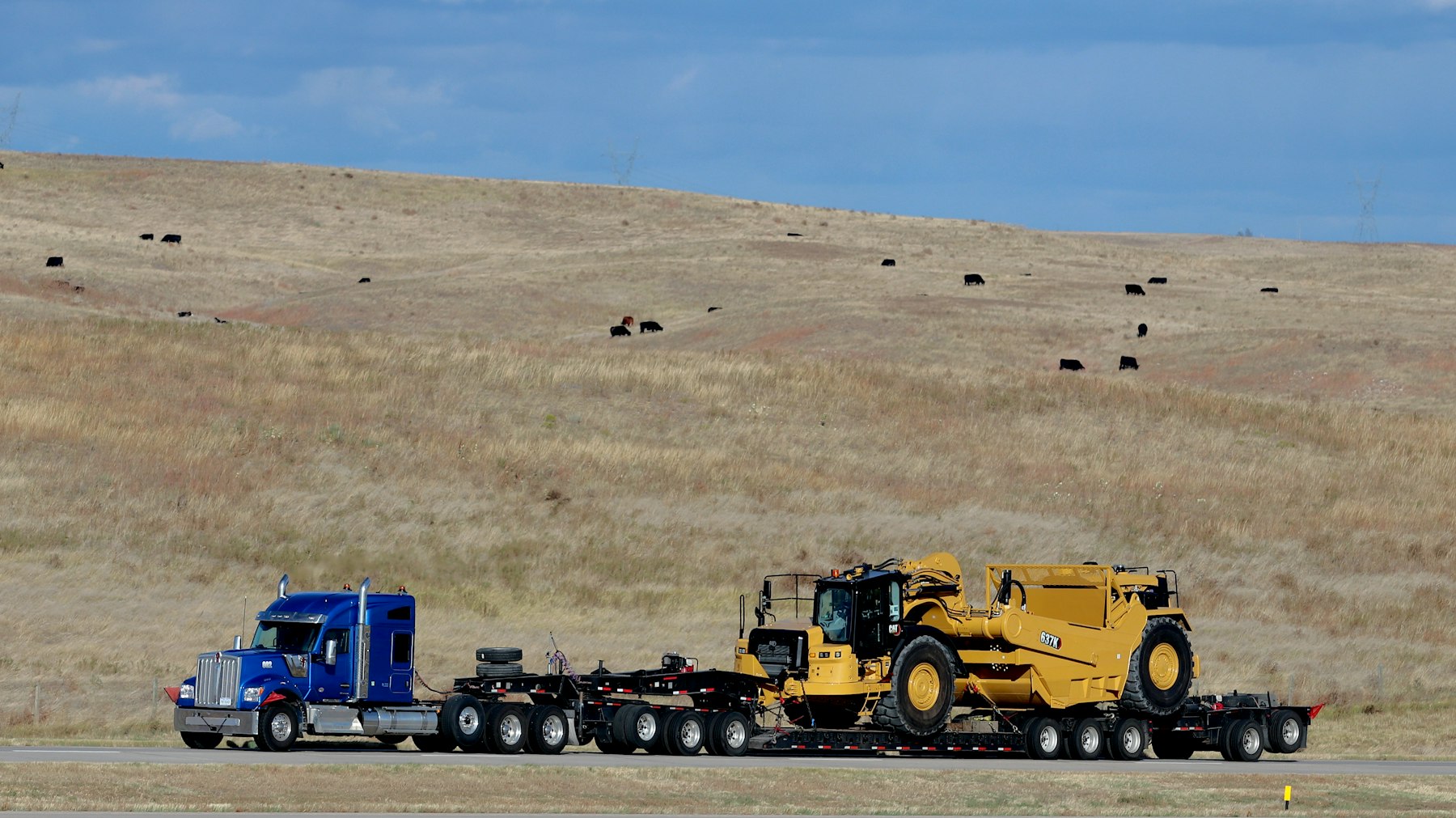 Open body truck loaded with cargo